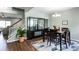 Elegant dining room featuring modern decor, stylish furnishings, and an open layout design at 1570 Shire Village Dr, Sugar Hill, GA 30518