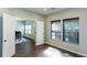 Versatile room featuring wood-look floors, perfect for a home office or study, with ample natural light at 1570 Shire Village Dr, Sugar Hill, GA 30518