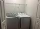 Functional laundry room with a modern washer and dryer at 2107 Hailston Dr, Duluth, GA 30097