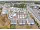 An aerial view shows modern homes in a well-planned community close to nearby shopping at 1393 Halpern Nw Ln, Kennesaw, GA 30144