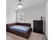 Bedroom featuring a bed, carpet, window, and closet at 1393 Halpern Nw Ln, Kennesaw, GA 30144