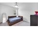 Cozy bedroom featuring a plush bed, carpet, and a bright window at 1393 Halpern Nw Ln, Kennesaw, GA 30144