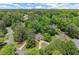 An elevated view of this home surrounded by mature trees reveals a meticulously landscaped property in a serene neighborhood at 194 Sentinel Se Pl, Marietta, GA 30067