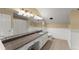 Bright bathroom with granite countertop, large vanity, and ample lighting at 194 Sentinel Se Pl, Marietta, GA 30067