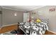 A bright bedroom with soccer themed decor and hardwood floors offers a playful space at 194 Sentinel Se Pl, Marietta, GA 30067