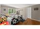 Comfortable bedroom with a soccer-themed bedspread and window views at 194 Sentinel Se Pl, Marietta, GA 30067