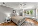 Relaxing bedroom with hardwood floors, a ceiling fan, and lots of natural light at 194 Sentinel Se Pl, Marietta, GA 30067
