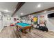 Recreational space with pool table, exercise equipment, and memorabilia on display at 194 Sentinel Se Pl, Marietta, GA 30067