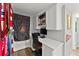 Functional home office space with built-in shelving and a comfortable workspace at 194 Sentinel Se Pl, Marietta, GA 30067