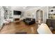 Spacious living room with fireplace, built-in shelves, and an open layout at 194 Sentinel Se Pl, Marietta, GA 30067