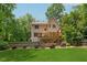 Spacious backyard featuring lush green lawn and mature trees at 2622 Murdock Rd, Marietta, GA 30062