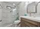 Modern bathroom with glass shower, marble tile, and stylish vanity at 2622 Murdock Rd, Marietta, GA 30062