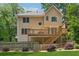 Back exterior view of home featuring a spacious deck and landscaped yard at 2622 Murdock Rd, Marietta, GA 30062