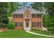 Charming brick two-story home featuring a well-manicured lawn and inviting front entrance at 2622 Murdock Rd, Marietta, GA 30062