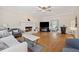 Spacious living room with hardwood floors, a fireplace, and an open layout, perfect for entertaining at 2622 Murdock Rd, Marietta, GA 30062