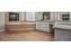 Relaxing bathroom with jacuzzi tub, fireplace, and granite countertops at 4519 Mossey Dr, Lithonia, GA 30038