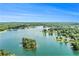 Scenic aerial view of a beautiful lake surrounded by lush green forests and picturesque islands at 5008 Monticello Dr, Villa Rica, GA 30180