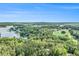 Beautiful aerial view of a lakeside community with lush forests and a scenic golf course at 5008 Monticello Dr, Villa Rica, GA 30180