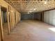Spacious unfinished basement featuring concrete floors and exposed ceiling; ready for your finishing touches at 5008 Monticello Dr, Villa Rica, GA 30180