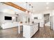 Open concept layout with sight lines between the kitchen, living room, and staircase at 5008 Monticello Dr, Villa Rica, GA 30180