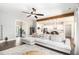 Bright living room featuring wood-look floors and an open layout with sight lines into the kitchen at 5008 Monticello Dr, Villa Rica, GA 30180