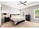 Spacious bedroom with trey ceiling, carpeted floor, and large windows providing natural light at 5008 Monticello Dr, Villa Rica, GA 30180