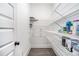 Well-organized pantry features white wire shelving, providing ample storage space at 5008 Monticello Dr, Villa Rica, GA 30180