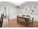 Bright dining room featuring hardwood floors, chandelier, and decorative wall art at 989 Brownstone Ln # 16, Marietta, GA 30008