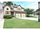 Charming home featuring a well-manicured lawn, a two car garage, and beautiful curb appeal at 989 Brownstone Ln # 16, Marietta, GA 30008