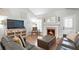 Living room includes hardwood floors and a cozy fireplace at 989 Brownstone Ln # 16, Marietta, GA 30008