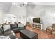 Open floor plan with high ceilings and hardwood floors in the living room at 989 Brownstone Ln # 16, Marietta, GA 30008