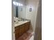 Bathroom features a granite countertop vanity and neutral tones at 1311 N Brandy Se Shls, Conyers, GA 30013