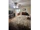 Bedroom featuring a queen-size bed and a large TV at 1311 N Brandy Se Shls, Conyers, GA 30013