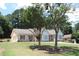 Attractive brick home with well-kept lawn and landscaping, showcasing curb appeal at 1311 N Brandy Se Shls, Conyers, GA 30013