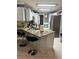 Kitchen with granite counters, white cabinets, and stainless steel appliances at 1311 N Brandy Se Shls, Conyers, GA 30013