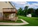 Lush backyard featuring a patio, deck, and a storage shed, providing plenty of room for outdoor activities at 1847 Oak Rd, Snellville, GA 30078
