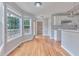 Breakfast nook off of the kitchen with hardwood floors, lots of light, and access to the deck at 1847 Oak Rd, Snellville, GA 30078