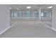 Large gym with multiple mirrors to assist with workouts and fitness routines at 1847 Oak Rd, Snellville, GA 30078