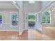 Bright foyer with hardwood floors and a view to the outside. A perfect space for welcoming guests at 1847 Oak Rd, Snellville, GA 30078
