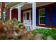 Welcoming front entrance with white door, sidelights, and charming porch, offering a warm greeting at 1847 Oak Rd, Snellville, GA 30078