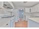Kitchen featuring white cabinets, stainless appliances, and granite countertops at 1847 Oak Rd, Snellville, GA 30078