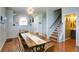 Lovely dining area featuring wooden floors and adjacent stairs at 2410 Clock Face Ct, Lawrenceville, GA 30043