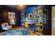 Home office features desk, shelves, and decor for productive space at 2410 Clock Face Ct, Lawrenceville, GA 30043