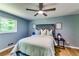 Relaxing bedroom with a large bed, modern decor, and ample natural light, creating a serene atmosphere at 2668 Kings Park Cir, Decatur, GA 30034