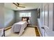 The bedroom has a modern bed and neutral decor with a window providing natural light at 2668 Kings Park Cir, Decatur, GA 30034