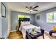 Charming bedroom with a wooden headboard, soft lighting, and modern furnishings, offering a relaxing retreat at 2668 Kings Park Cir, Decatur, GA 30034
