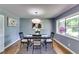 Contemporary dining room with stylish lighting and modern furnishings at 2668 Kings Park Cir, Decatur, GA 30034