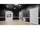 Finished basement featuring hardwood flooring and a modern full bathroom at 456 Crestmont Ln, Canton, GA 30114