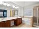 Large bathroom features a dual vanity, soaking tub, and a separate glass shower at 456 Crestmont Ln, Canton, GA 30114