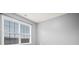 Neutral bedroom showcasing a window with blinds allowing for a bright and adaptable area at 456 Crestmont Ln, Canton, GA 30114